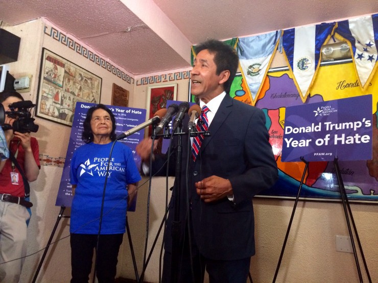 Walter Tejada (center) and Dolores Huerta (left) say Latino voters will be the ones to bring down Donald Trump in November. CREDIT: Alice Ollstein