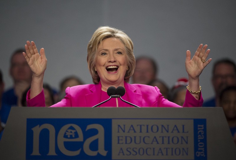 Democratic presidential candidate Hillary Clinton arrives to address the The National Education Association (NEA) Representative Assembly in Washington, Tuesday, July 5, 2016. CREDIT: MOLLEY RILEY, AP