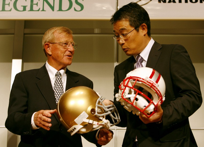 Former Notre Dame college football coach Lou Holtz, left, chats with Kiyoyuki Mori, head coach of Japan national football team, at a press conference in Tokyo, Japan, Friday, Feb. 20, 2009. CREDIT: JUNIJI KUROKAWA, AP