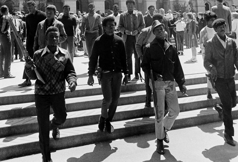 Armed members of the Black Panther Party leave the Capitol in Sacramento, California May 2, 1967. CREDIT: AP PHOTO