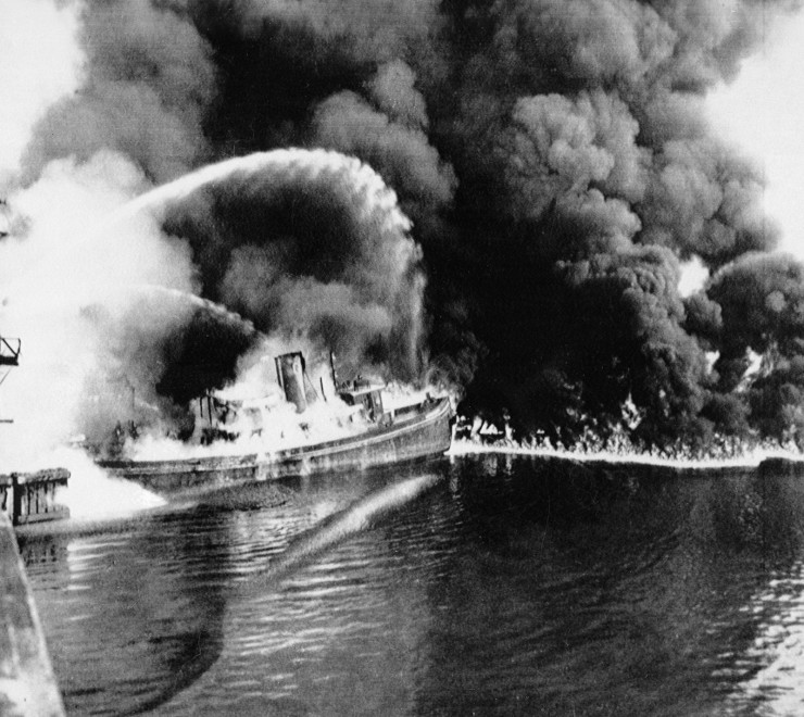 The Cuyahoga River, near downtown Cleveland, on fire in 1952. CREDIT: AP Photo, File