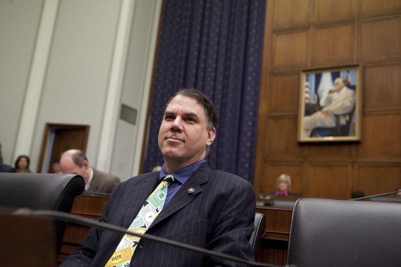 House Financial Services Committee member Rep. Alan Grayson, D-Fla., listens to Federal Reserve Chairman Ben Bernanke testify before the committee on Capitol Hill in Washington, Thursday, Oct. 1, 2009. (AP Photo/Evan Vucci)
