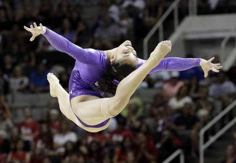 In this July 8, 2016 file photo, Lauren Hernandez competes on the floor exercise during the women’s U.S. Olympic gymnastics trials in San Jose, Calif. CREDIT: AP Photo/Gregory Bull, File