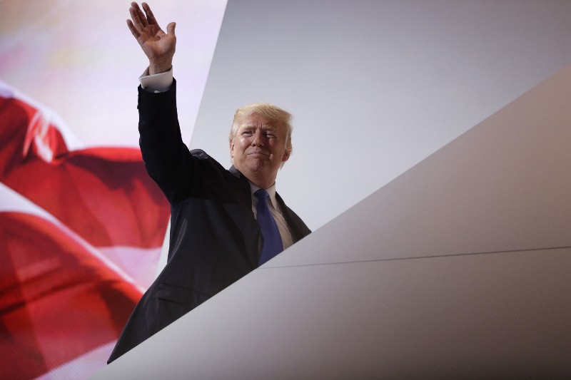 Donald Trump waves as he leaves the stage during the Republican National Convention, July 18, 2016, in Cleveland. CREDIT: AP PHOTO/JOHN LOCHER