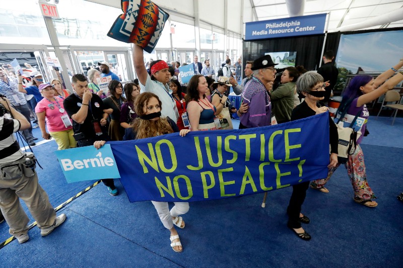 Delegates walk out of the convention as they protest during the second day session of the Democratic National Convention in Philadelphia, Tuesday, July 26, 2016. CREDIT: AP PHOTO/MATT ROURKE