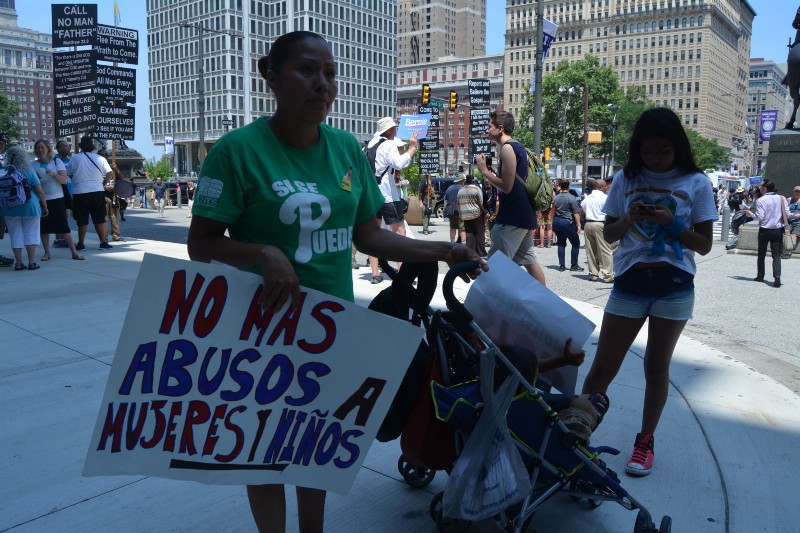 Latino activists march outside the DNC in protest of the deportations carried out by the Obama Administration. CREDIT: KIRA LERNER