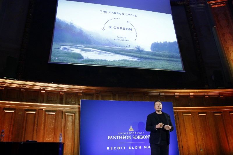 Tesla Motors Inc. CEO Elon Musk delivers a conference at the Paris Pantheon Sorbonne University as part of the COP21, United Nations Climate Change Conference, in Paris, Wednesday, Dec. 2, 2015. CREDIT: AP PHOTO/FRANCOIS MORI
