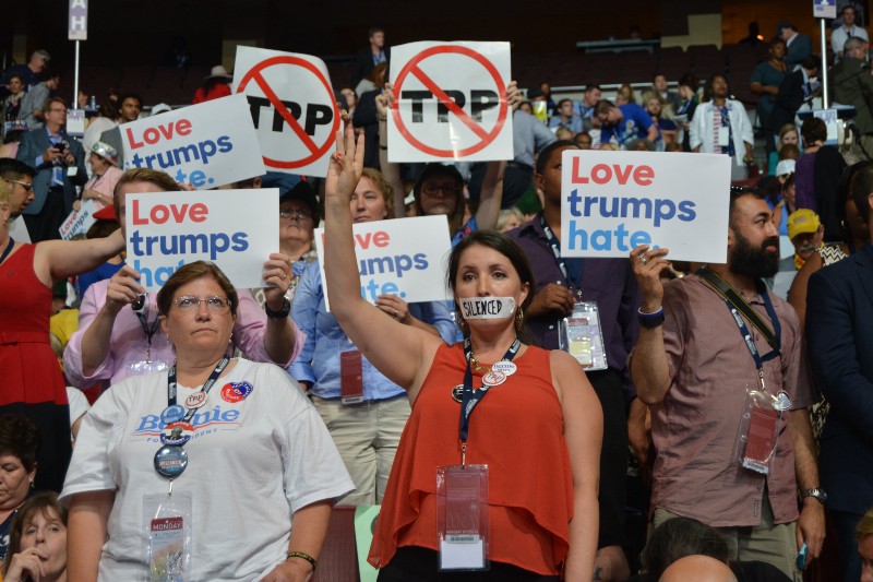 Delegates protest the TPP from the floor of the convention. CREDIT: KIRA LERNER