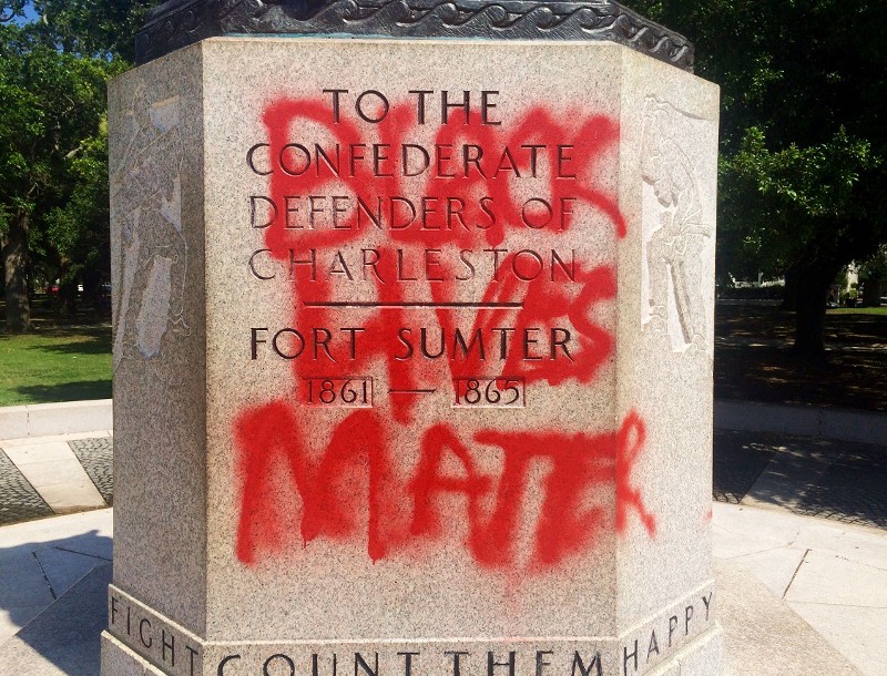 A statue memorializing the Confederacy is spray-painted with the message “Black Lives Matter” several days after a shooting at a historic black church Sunday, June 21, 2015, in Charleston, S.C. (AP Photo/WCSC-TV, Philip Weiss) CREDIT: PHILIP WEISS, AP