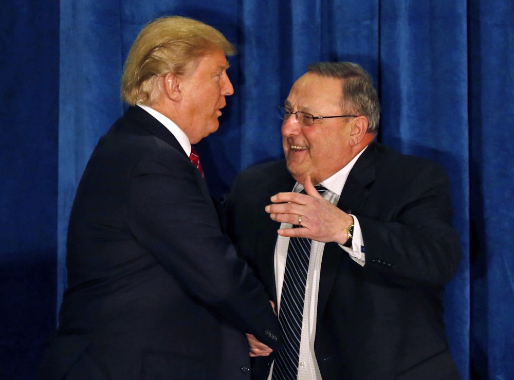 Gov. Paul LePage (R-ME) shaking hands with Republican presidential nominee Donald Trump in March. CREDIT: AP Photo/Robert F. Bukaty, File