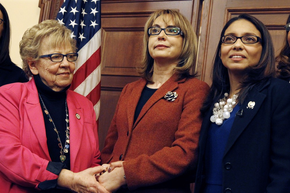Former U.S. Rep. Gabrielle Giffords, center, of Arizona, with New Jersey Assemblywoman Gabriela Mosquera, right, state Sen. Loretta Weinberg, left. CREDIT: AP Photo/Mel Evans
