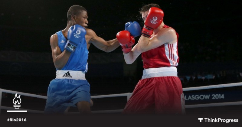 Jonas Junias (left), pictured here at the Britain Commonwealth Games in 2014, is one of two Olympic boxers who have been arrested for sexual assault. CREDIT: AP PHOTO/PETER MORRISON, THINKPROGRESS/DYLAN PETROHILOS