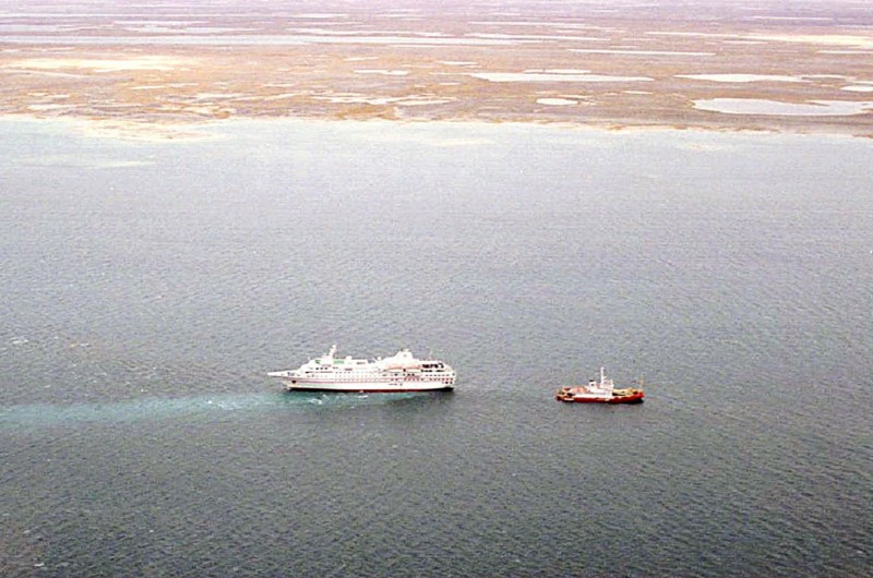 The Bahamian-registered cruise ship Hanseatic sits run aground near King William Island, September 1996. Strong winds indefinitely delayed plans to send the Canadian Coast Guard ship Nahidik to the Hanseatic and its 268 passengers after it ran aground 10 days earlier. The ship was about 150 miles east of Cambridge Bay, where the Crystal Serenity will make a port of call. CREDIT: AP PHOTO/CANADIAN COAST GUARD