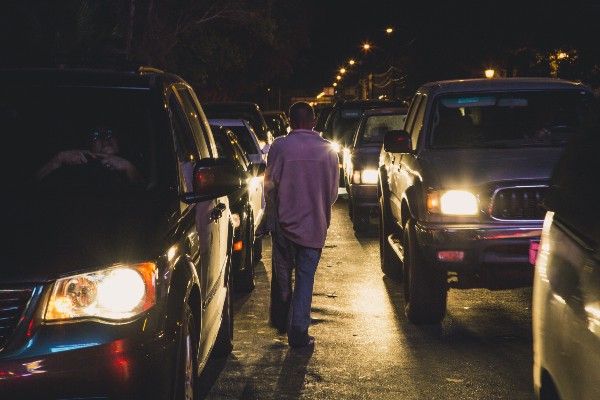 A man begs for money on the Mexicali side of Calexico’s west port of entry. CREDIT: ALEJANDRO DÁVILA FRAGOSO, THINKPROGRESS
