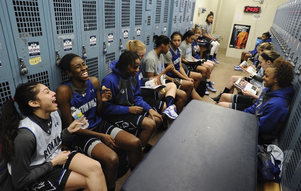 The Seton Hall women’s basketball team hanging out and having a good time in the locker room before the 2015 NCAA tournament. CREDIT: AP PHOTO/JESSICA HILL