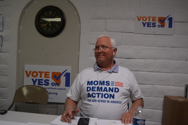 Doug Smithson phone banks for Nevadans for Background Checks. CREDIT: Kira Lerner