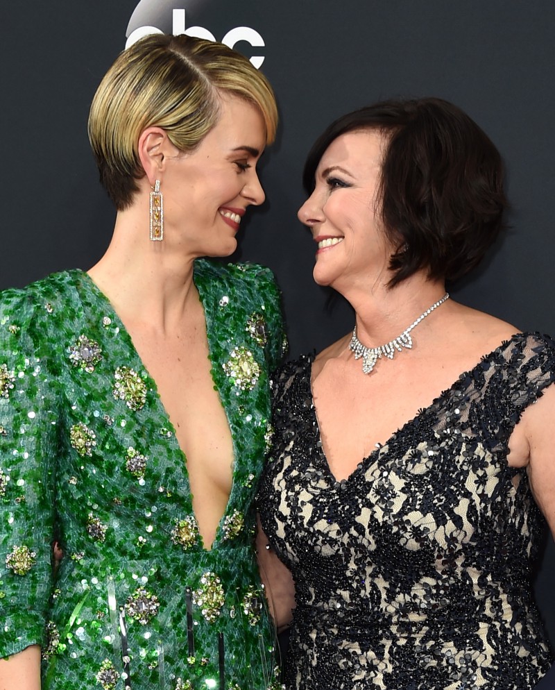 Sarah Paulson and Marcia Clark at the 2016 Emmy Awards. CREDIT: JORDAN STRAUSS/INVISION/AP