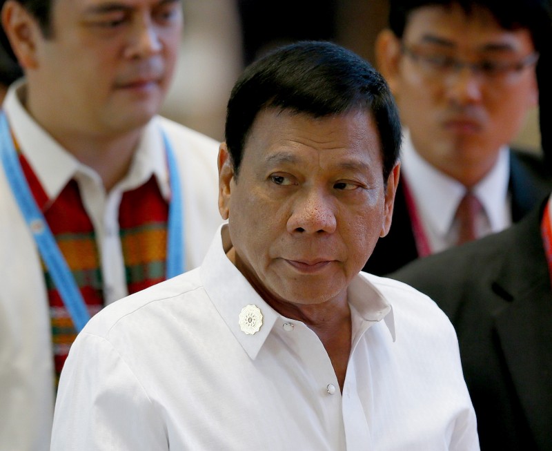 Philippine President Rodrigo Duterte arrives at the National Convention Center for scheduled bilateral meetings with ASEAN leaders. CREDIT: AP PHOTO/BULLIT MARQUEZ