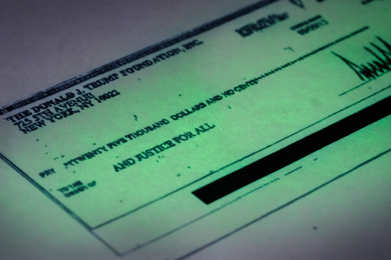 An improper Trump Foundation payment to a committee supporting Florida Attorney General Pam Bondi (R) CREDIT: AP PHOTO/J. DAVID AKE