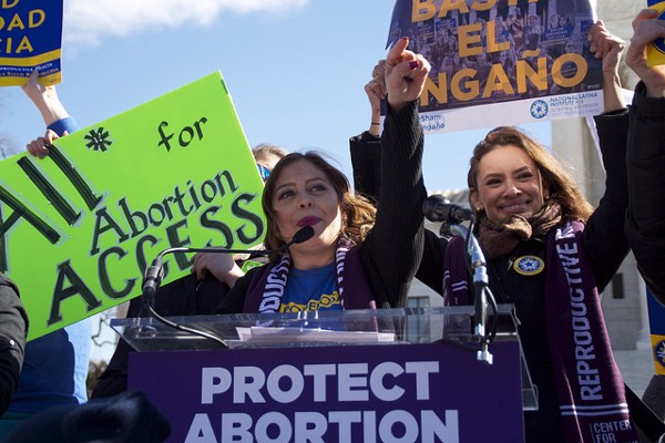The author speaking at a rally to protect abortion access at the Supreme Court earlier this year. CREDIT: All*Above All