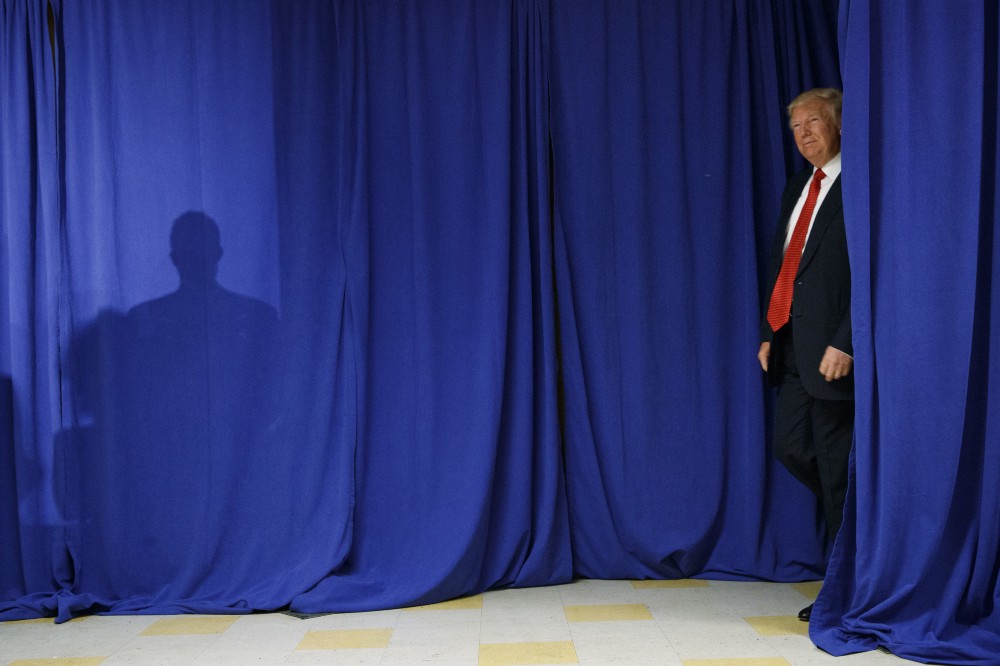 Republican presidential candidate Donald Trump arrives to speak about school choice, Thursday, Sept. 8, 2016, at Cleveland Arts and Social Sciences Academy in Cleveland. CREDIT: AP Photo/Evan Vucci