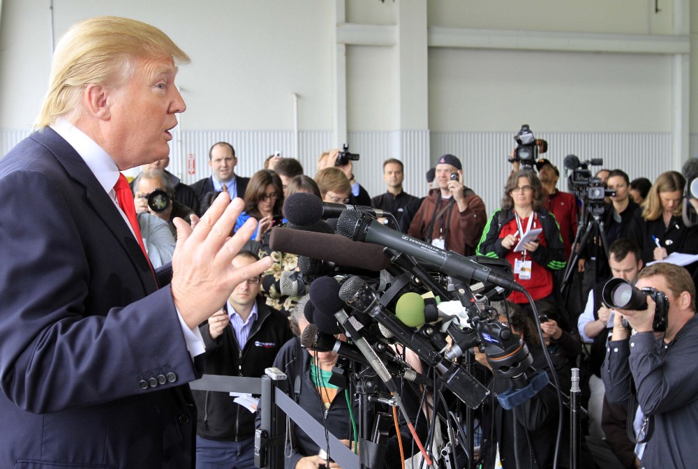 Donald Trump, a possible 2012 presidential candidate, talks to reporters after arriving at the Pease International Tradeport Wednesday, April 27, 2011 in Portsmouth, N.H. Trump said he was “very proud” to have forced the White House’s decision to release President Barack Obama’s birth certificate. CREDIT: AP Photo/Jim Cole