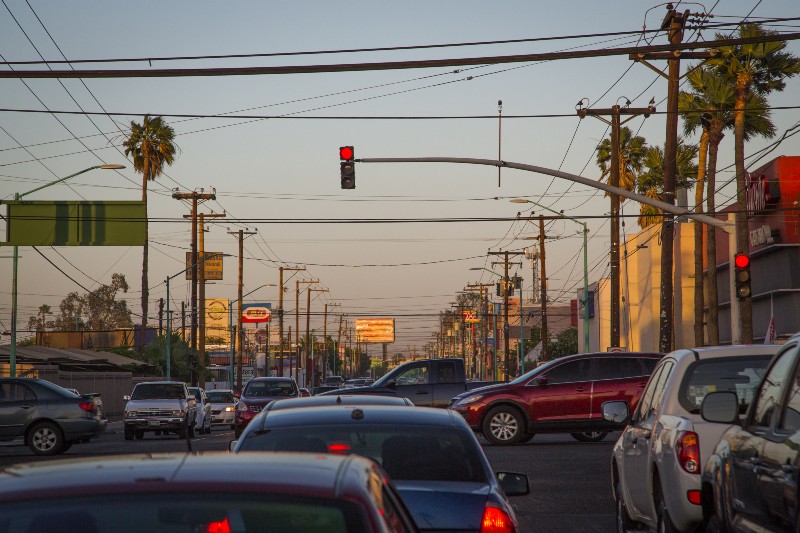 Smog hovers over rush hour in Mexicali, Baja California. Mexicali vehicles are considered the largest source of pollution but experts said they can’t know for sure since state monitoring systems have been mostly down since 2008. CREDIT: ALEJANDRO DÁVILA FRAGOSO, THINKPROGRESS