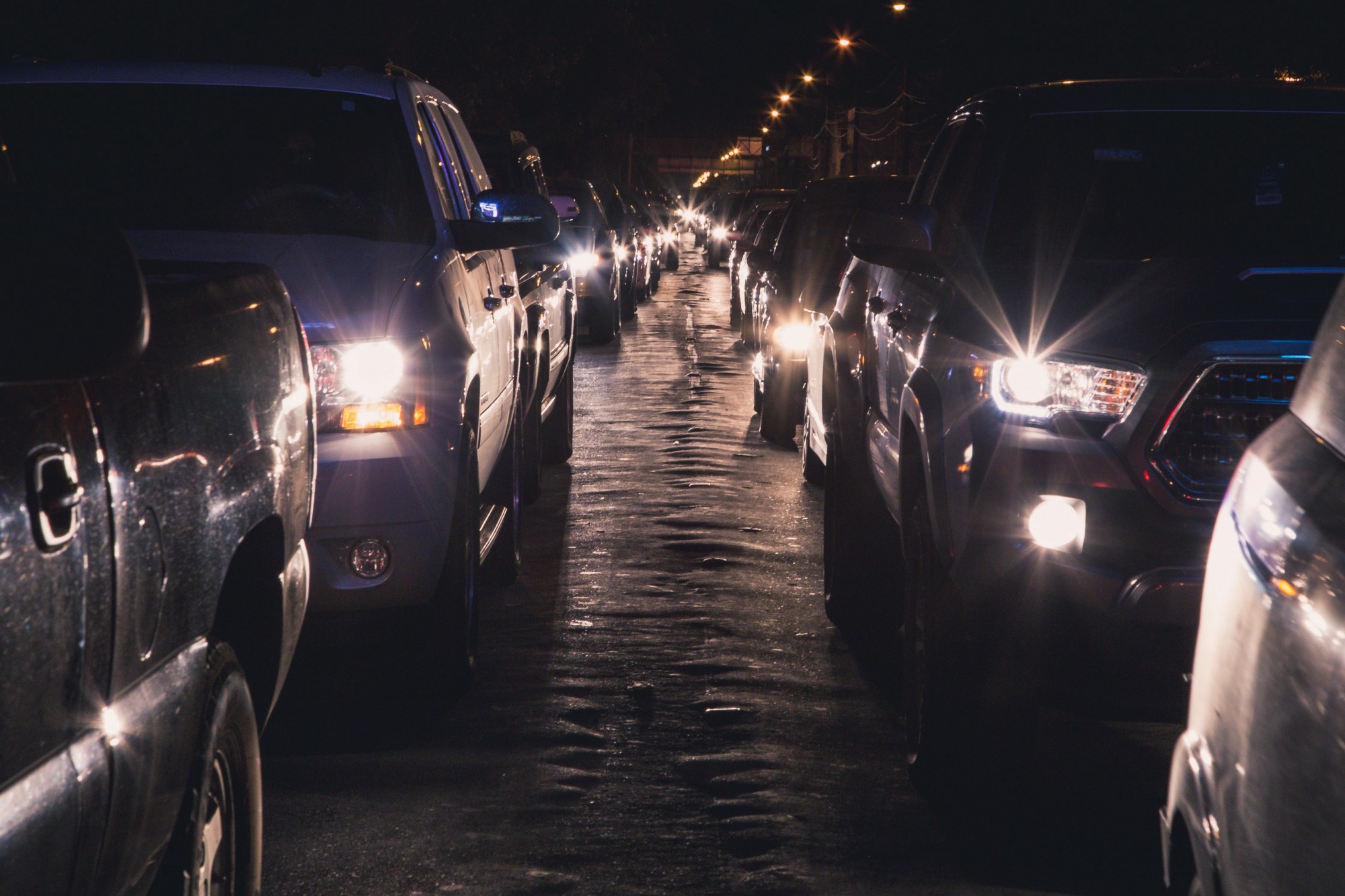 Lines of cars and trucks idle for hours in Mexicali, Baja California, during the early hours of a recent Sunday as they wait their turn to be inspected and cross into downtown Calexico, California. CREDIT: ALEJANDRO DÁVILA FRAGOSO, THINKPROGRESS