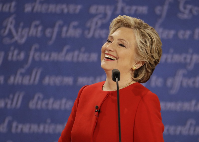 Democratic presidential nominee Hillary Clinton laughs to Republican presidential nominee Donald Trump during the presidential debate at Hofstra University in Hempstead, N.Y., Monday, Sept. 26, 2016. CREDIT: AP Photo/Julio Cortez