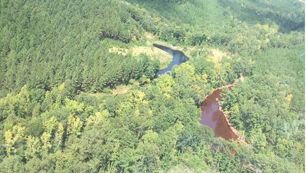 View of gasoline in retention ponds in Shelby County, Alabama. CREDIT: COLONIAL PIPELINE
