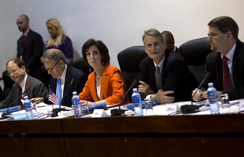 Jeffrey DeLaurentis, second left, chief of mission at the U.S. Interests Section in Havana, starts the second day of negotiations with Cuban officials, in Havana, Cuba, Jan. 22, 2015. CREDIT: AP Photo/Ramon Espinosa