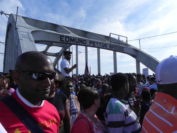 Alabama residents recreate the “Bloody Sunday” march for voting rights on its 50th anniversary in Selma, Alabama. CREDIT: Alice Ollstein
