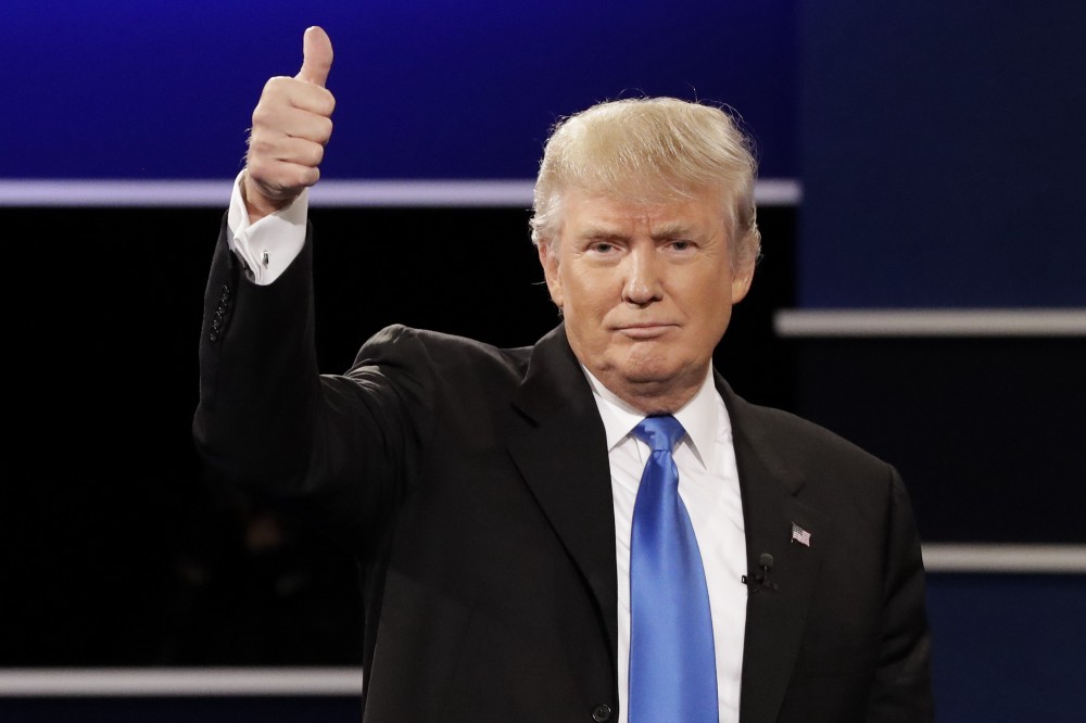 Republican presidential nominee Donald Trump flashes a thumbs up after the presidential debate with Democratic presidential nominee Hillary Clinton at Hofstra University in Hempstead, N.Y., Monday, Sept. 26, 2016. CREDIT: AP Photo/David Goldman