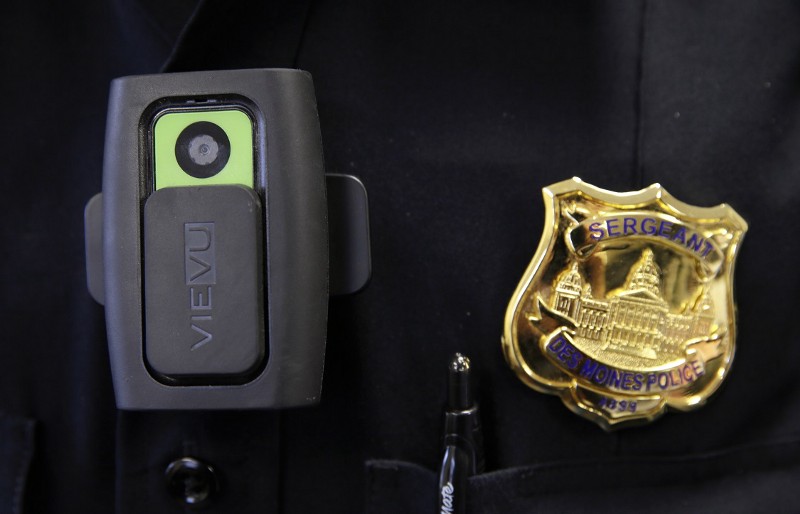 A body camera used by Des Moines Police Department school resource officers is worn by Sgt. Jason Halifax in Des Moines, Iowa. CREDIT: AP/CHARLIE NEIBERGALL