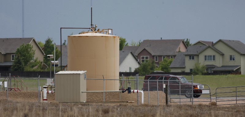 Fracking takes place too close to communities, activists and health reports say. CREDIT: AP Photo/David Zalubowski
