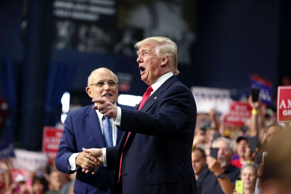 On Sunday, Rudy Giuliani offered a thing, repetitive defense of Donald Trump’s stated belief that being a star means he can get away with sexual assault. CREDIT: AP Photo/Gerald Herbert