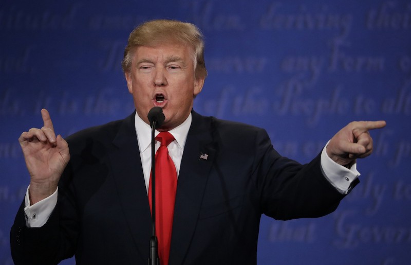 Republican presidential nominee Donald Trump speaks to Democratic presidential nominee Hillary Clinton during the third presidential debate at UNLV in Las Vegas, Wednesday, Oct. 19, 2016. CREDIT: AP/David Goldman