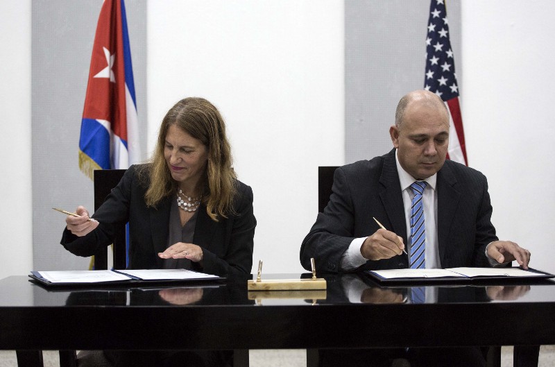 United States Secretary of Health and Human Services Sylvia Burwell, left, and Cuba’s Public Health Minister Roberto Morales Ojeda sign an understanding memorandum in Havana, Cuba, Thursday, Oct. 20, 2016. Burwell is on an official visit to Cuba. Credit: AP Photo/Desmond Boylan