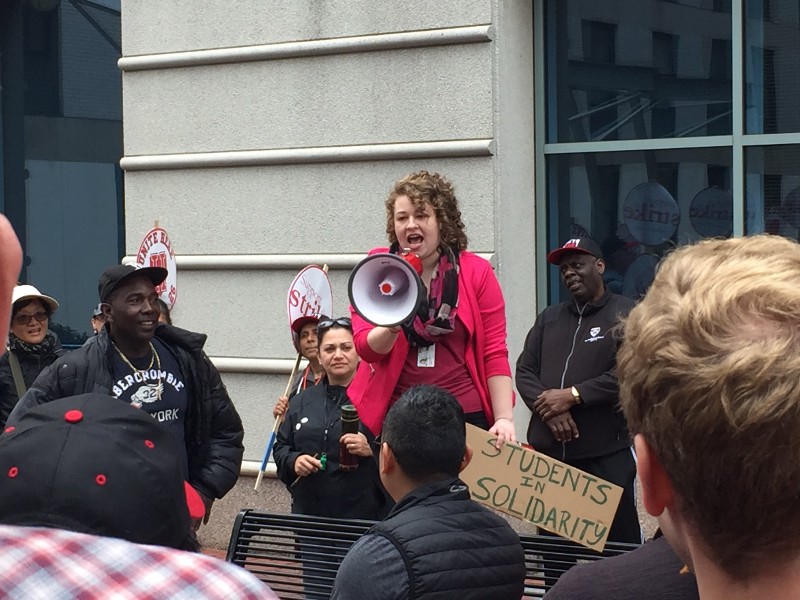 Monica Kriete participates in a campus rally supporting dining hall workers. CREDIT: Nhi Tran