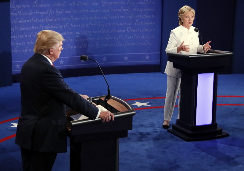 Democratic presidential nominee Hillary Clinton debates with Republican presidential nominee Donald Trump during the third presidential debate at UNLV in Las Vegas, Wednesday, Oct. 19, 2016. CREDIT: Mark Ralston/Pool via AP