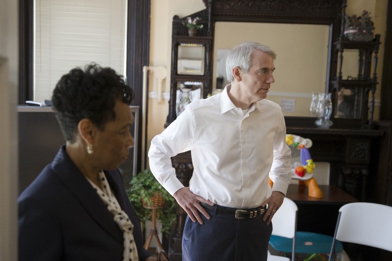U.S. Sen. Rob Portman (R-Ohio) tours the First Step Home, a women’s drug addiction treatment facility, with president and CEO Margo Spence. CREDIT: Associated Press/ John Minchillo