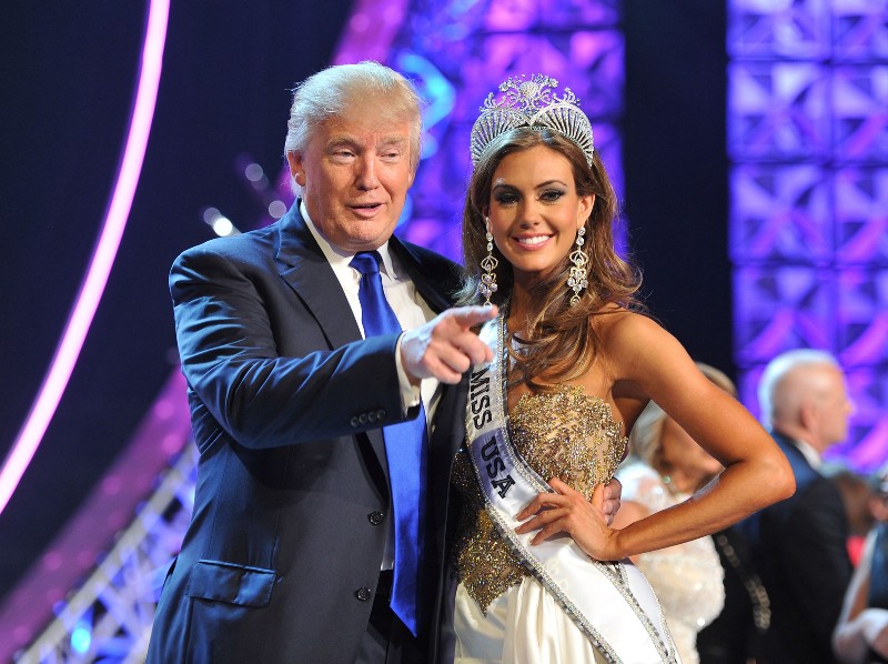 Donald Trump with Erin Brady, winner of the 2013 Miss USA pageant. CREDIT: AP Photo/Jeff Bottari