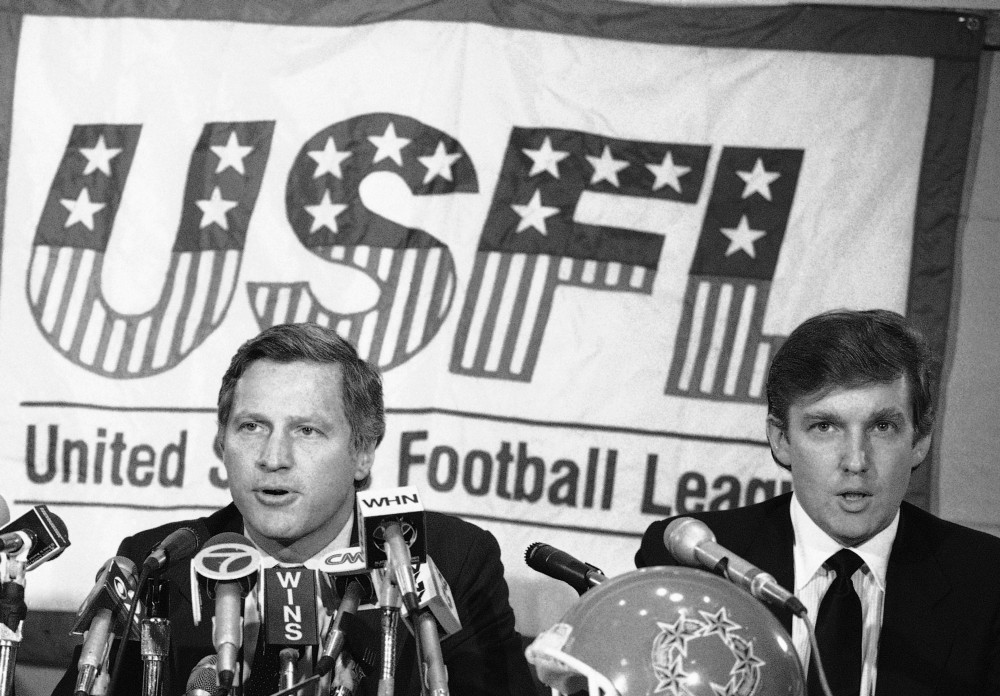 Donald Trump (right) once bought a USFL franchise before driving the entire league into the ground. CREDIT: AP Images