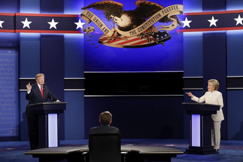 Donald Trump and Hillary Clinton at the third presidential debate. CREDIT: AP Photo/John Locher