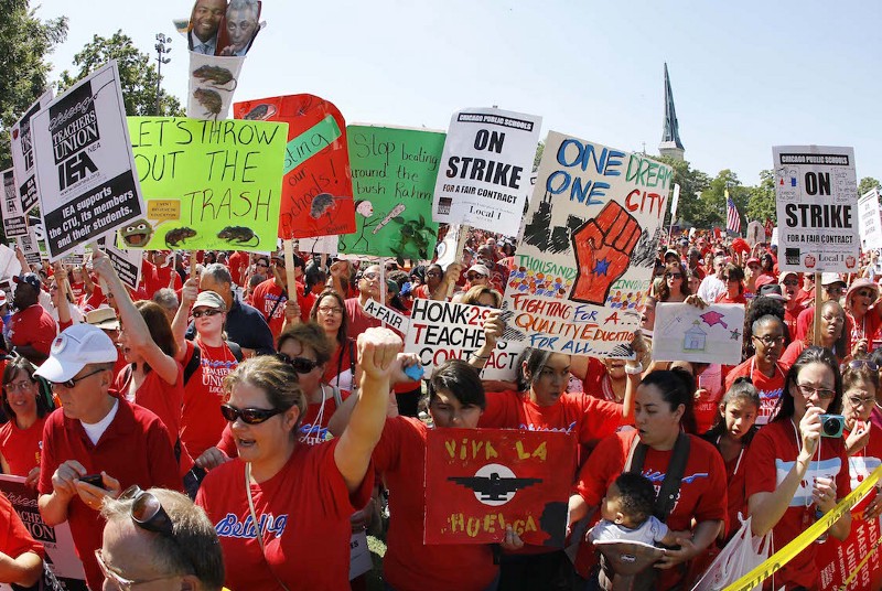 Striking Chicago school teachers rally at Union Park Saturday, Sept. 15, 2012, in Chicago. CREDIT: AP/Charles Rex Arbogast