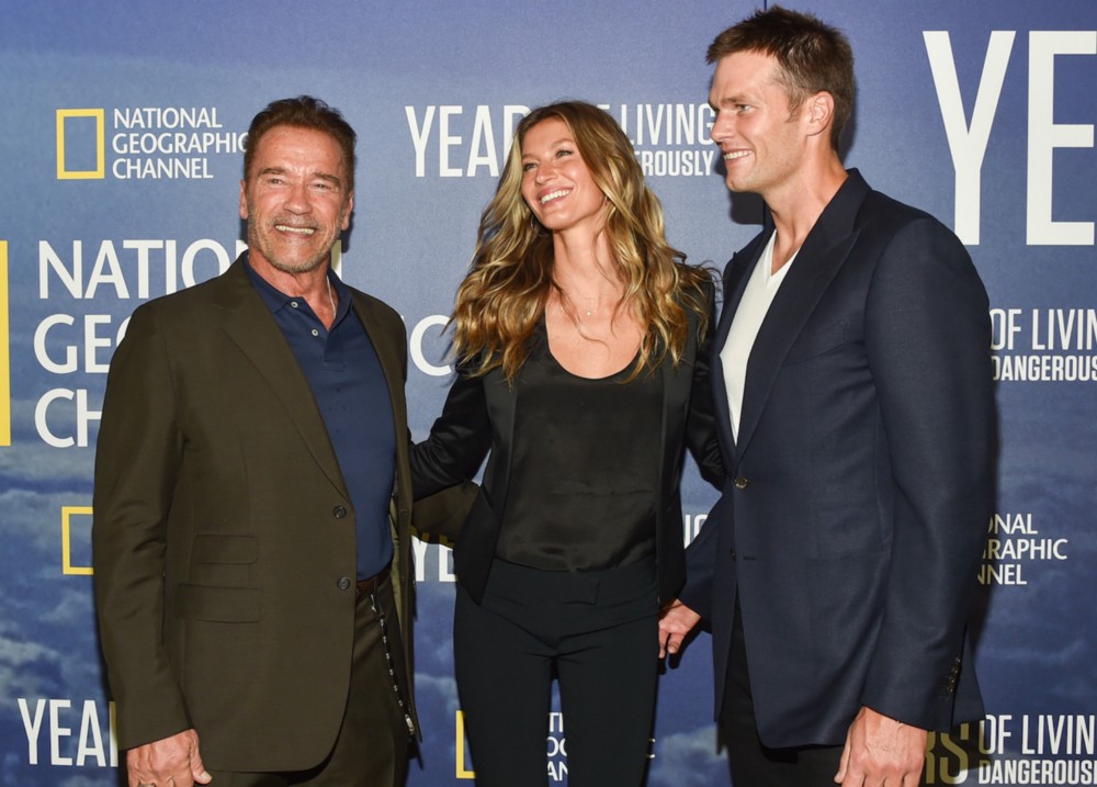 Arnold Schwarzenegger, Gisele Bundchen and her husband Tom Brady at NY premiere of National Geographic Channel’s, “Years of Living Dangerously.” CREDIT: AP/Invision/Evan Agostini.