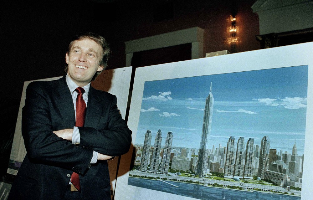 Donald Trump with an artist’s concept of “Television City” in 1985. CREDIT: AP Photo/Marty Lederhandler