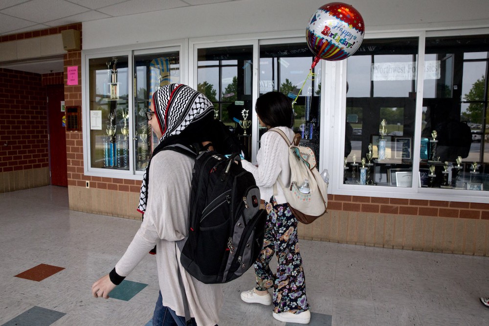 Muslims are contemplating abandoning their religious garb for fear of being targeted. CREDIT: AP Images