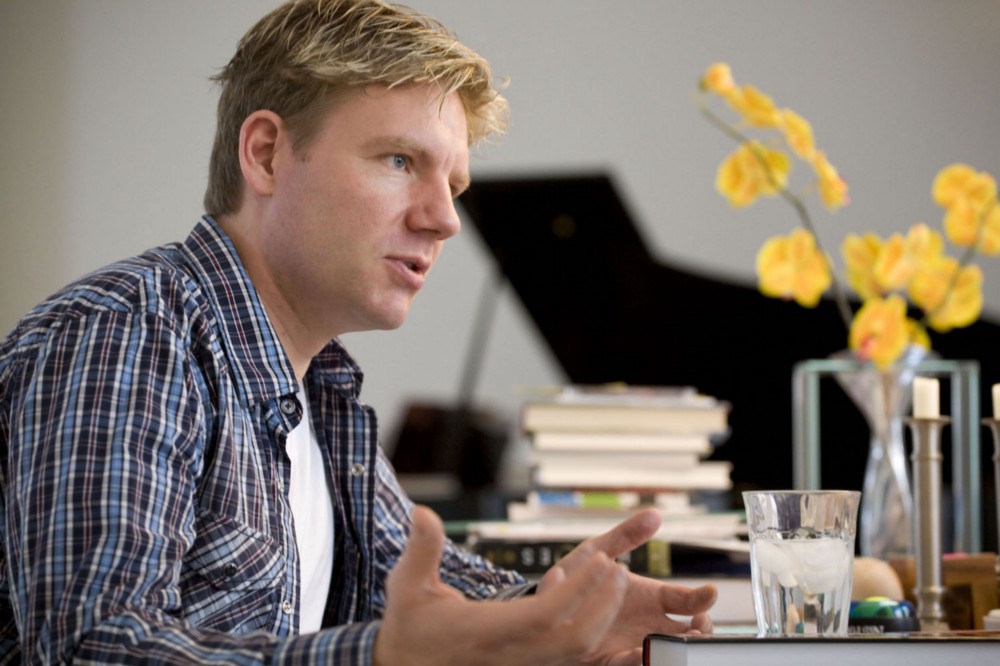 Bjorn Lomborg with a glass of melting ice — a metaphor for his proposed climate policies. CREDIT: AP/Christopher Patrick Grant’s’s