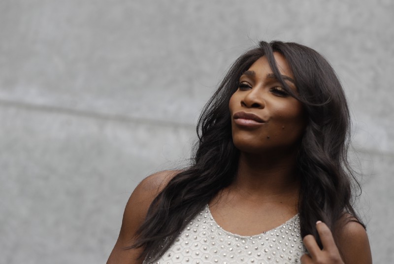 U.S. tennis star Serena Williams poses for photographers prior to the start of the Giorgio Armani women’s Spring-Summer 2017 fashion show, that was presented in Milan, Italy, Friday, Sept. 23, 2016. CREDIT: AP Photo/Luca Bruno